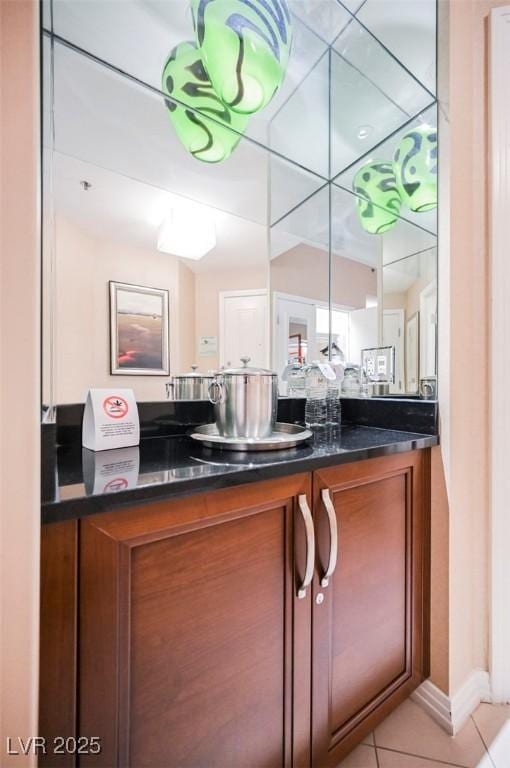 145 E Harmon Ave Unit 2503, Las Vegas, NV 89109 - bathroom featuring tile patterned flooring and vanity