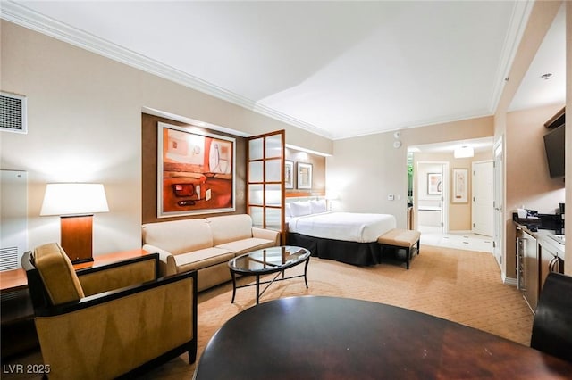 bedroom with visible vents and ornamental molding