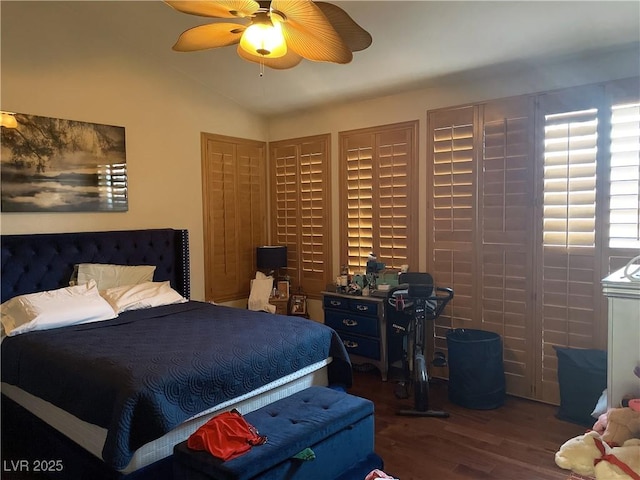 bedroom featuring wood finished floors and a ceiling fan