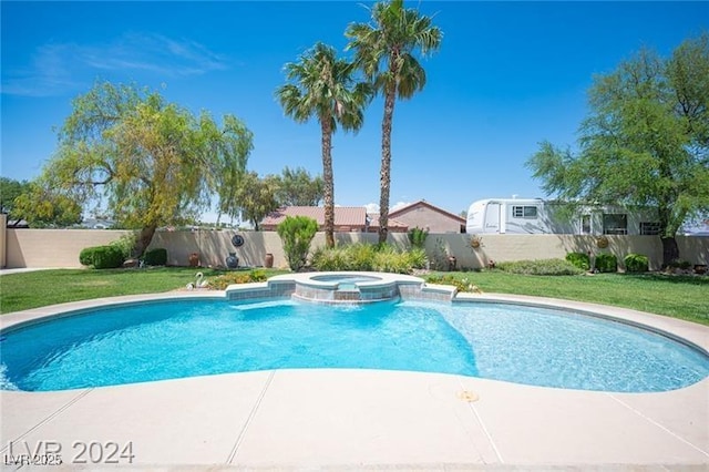 view of swimming pool with a fenced backyard, a pool with connected hot tub, and a lawn