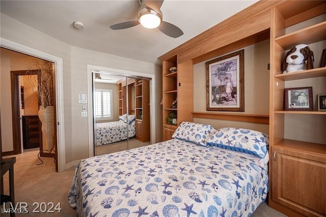 bedroom featuring carpet floors, a closet, and a ceiling fan