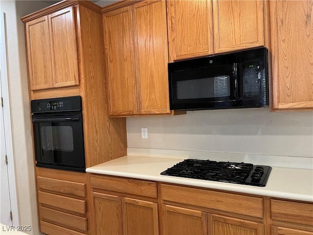 2461 Brooklyn Bridge St, Las Vegas, NV 89135 - kitchen featuring black appliances and light countertops