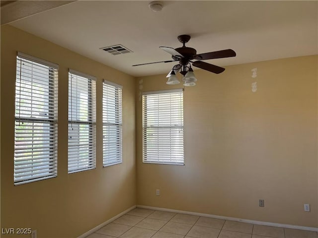 2461 Brooklyn Bridge St, Las Vegas, NV 89135 - empty room with ceiling fan, light tile patterned floors, and a smoke detector
