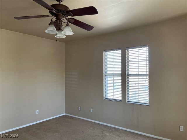 2461 Brooklyn Bridge St, Las Vegas, NV 89135 - unfurnished room with carpet flooring, baseboards, and a ceiling fan