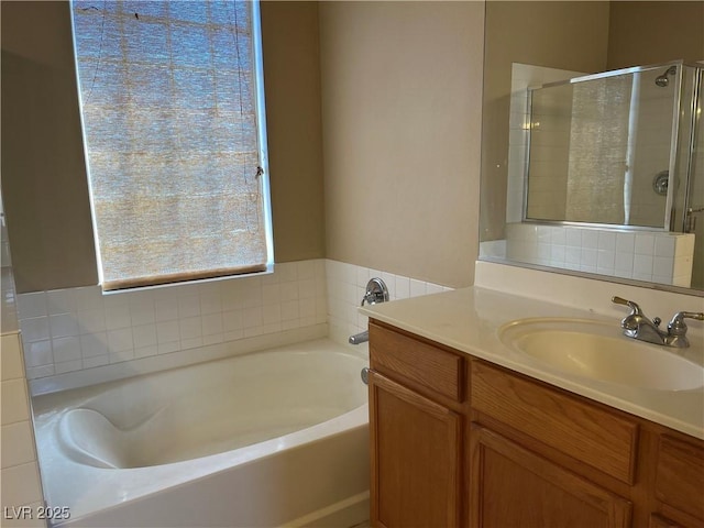 2461 Brooklyn Bridge St, Las Vegas, NV 89135 - bathroom featuring vanity, a garden tub, and a stall shower