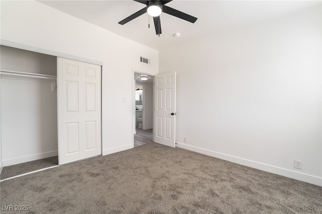 unfurnished bedroom with ceiling fan, visible vents, baseboards, a closet, and carpet