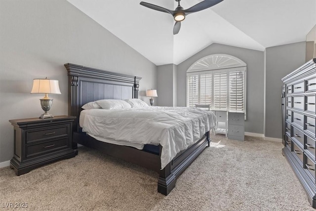 bedroom featuring lofted ceiling, ceiling fan, baseboards, and light colored carpet