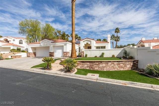 mediterranean / spanish house featuring driveway, a tile roof, an attached garage, fence, and stucco siding