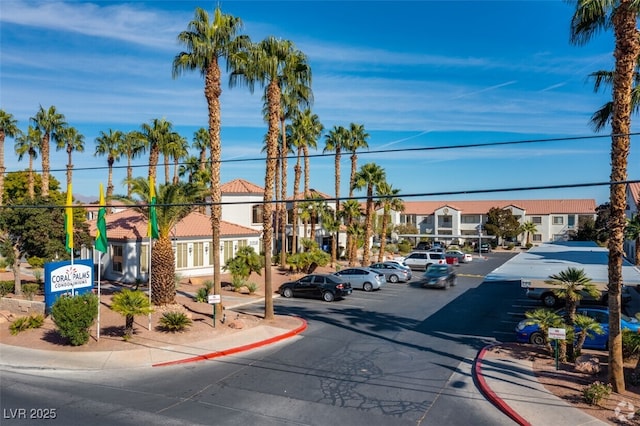 view of street featuring curbs, sidewalks, and a residential view