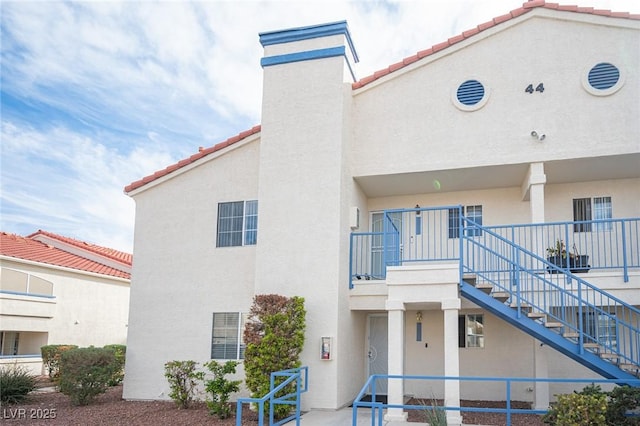 view of building exterior featuring stairs