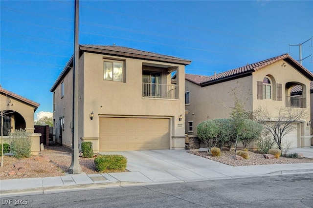 view of front of property with concrete driveway, a balcony, a garage, and stucco siding