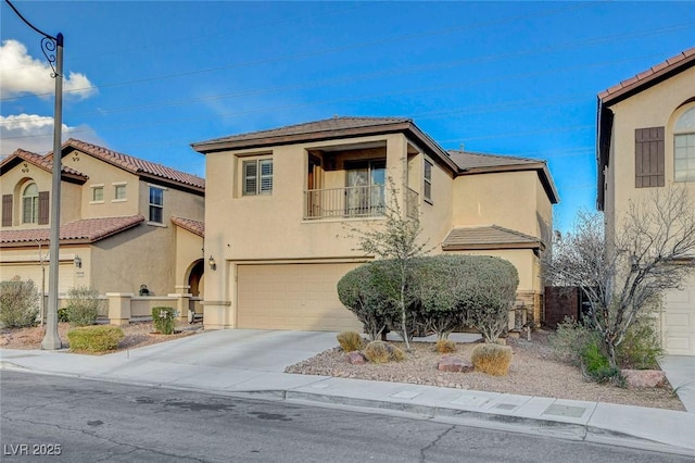 view of front of home with stucco siding, driveway, an attached garage, and a balcony