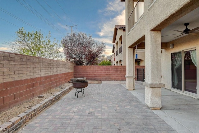 view of patio featuring a ceiling fan and a fenced backyard