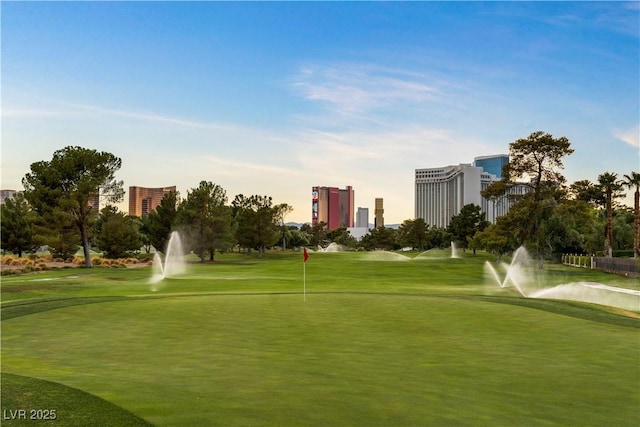 view of property's community featuring a city view and golf course view