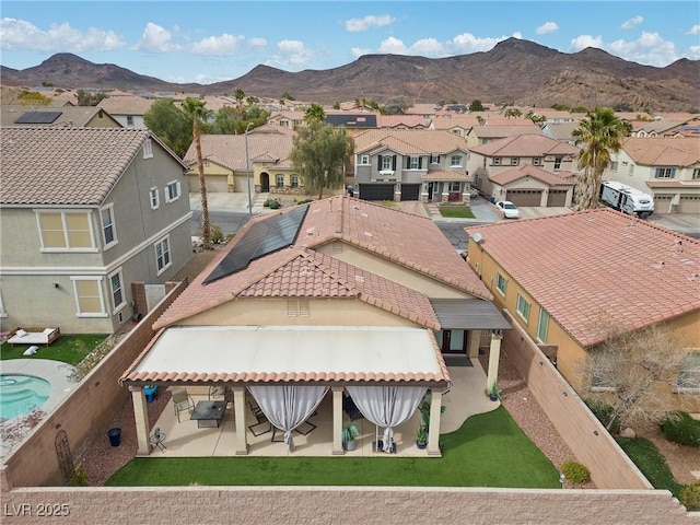 birds eye view of property featuring a residential view and a mountain view