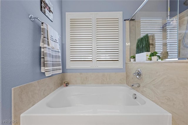 bathroom featuring a garden tub