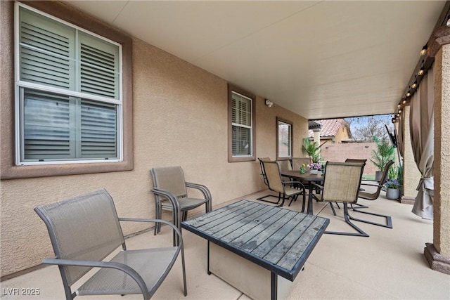 view of patio / terrace with fence and outdoor dining space