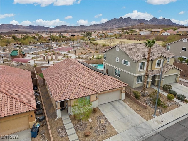 birds eye view of property featuring a residential view and a mountain view