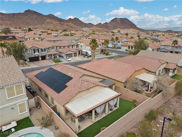 birds eye view of property featuring a residential view and a mountain view