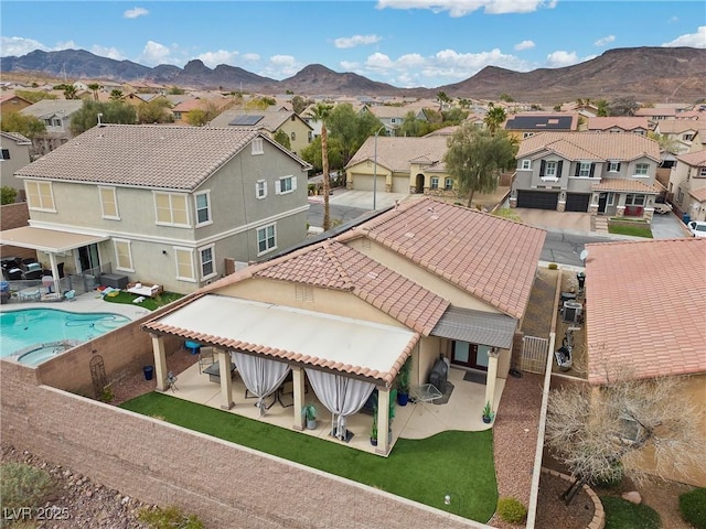 bird's eye view featuring a residential view and a mountain view