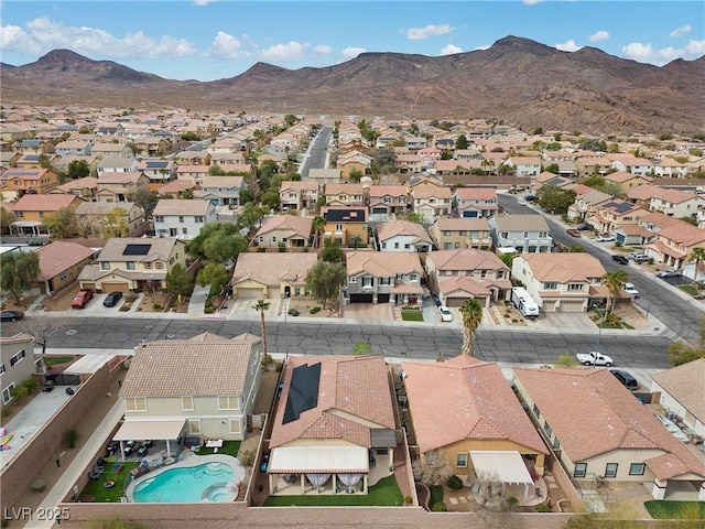 aerial view with a residential view and a mountain view