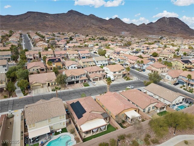 bird's eye view with a residential view and a mountain view