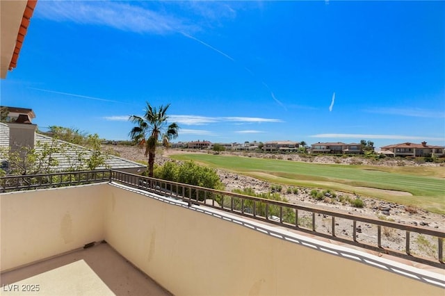 balcony featuring view of golf course