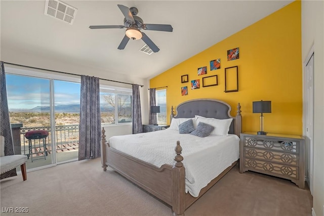 carpeted bedroom featuring access to exterior, visible vents, a ceiling fan, and vaulted ceiling