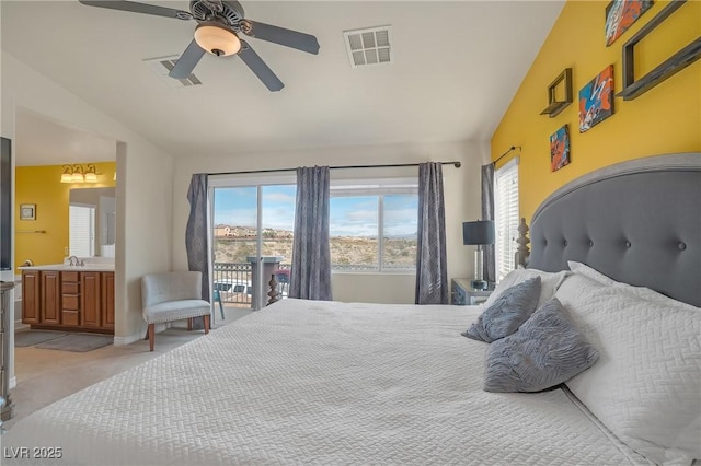 bedroom featuring vaulted ceiling, a ceiling fan, visible vents, and light carpet