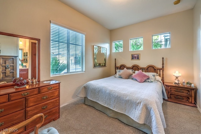 bedroom featuring carpet