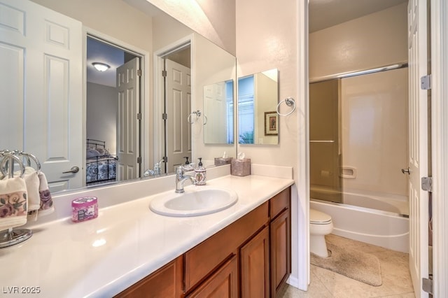 bathroom with toilet, tile patterned floors, bathing tub / shower combination, and vanity