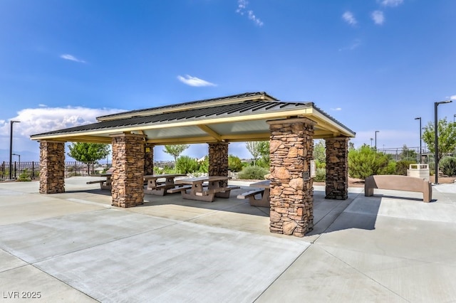 view of patio / terrace with a gazebo and fence