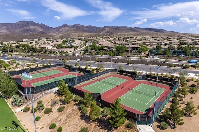 birds eye view of property with a residential view and a mountain view