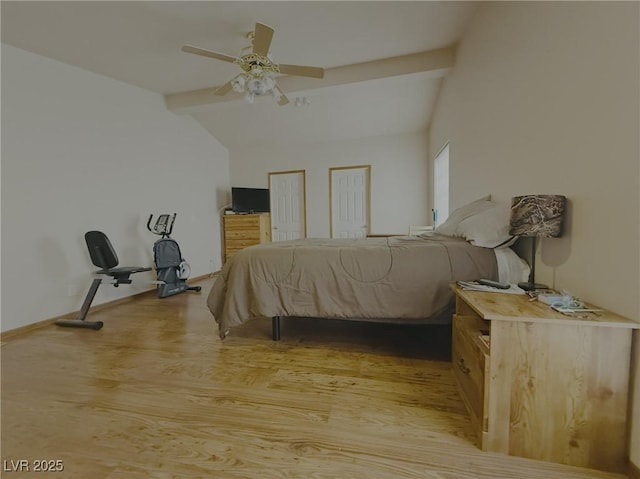 bedroom with a ceiling fan, baseboards, lofted ceiling with beams, light wood-style flooring, and multiple closets