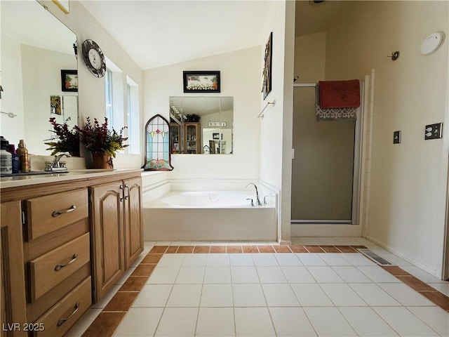 full bath with tile patterned flooring, a shower stall, a bath, and lofted ceiling