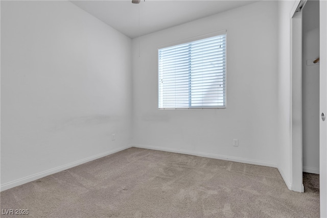 unfurnished bedroom with baseboards, ceiling fan, and carpet flooring