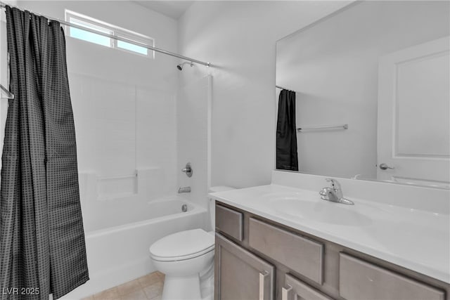 full bathroom with tile patterned flooring, toilet, vanity, and shower / bath combo