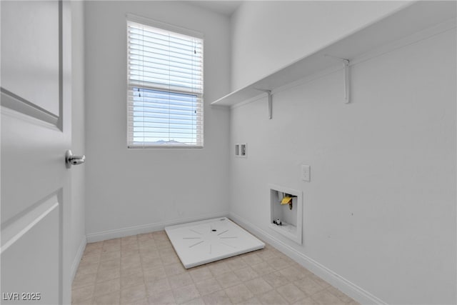 clothes washing area featuring laundry area, hookup for a washing machine, baseboards, and light floors