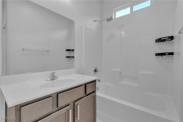 bathroom with vanity and bathtub / shower combination