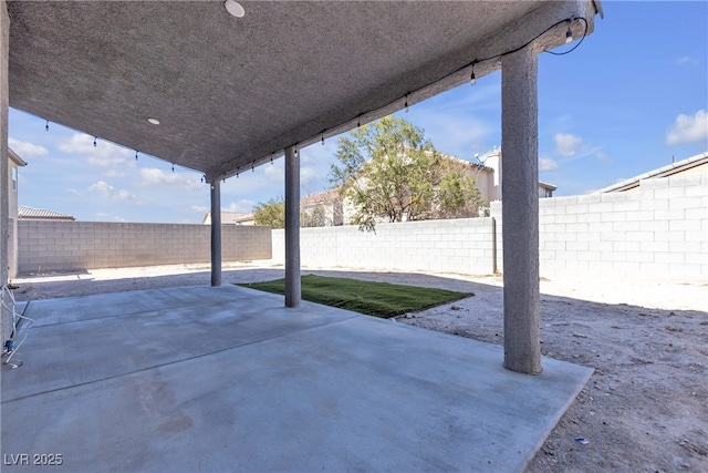 view of patio featuring a fenced backyard