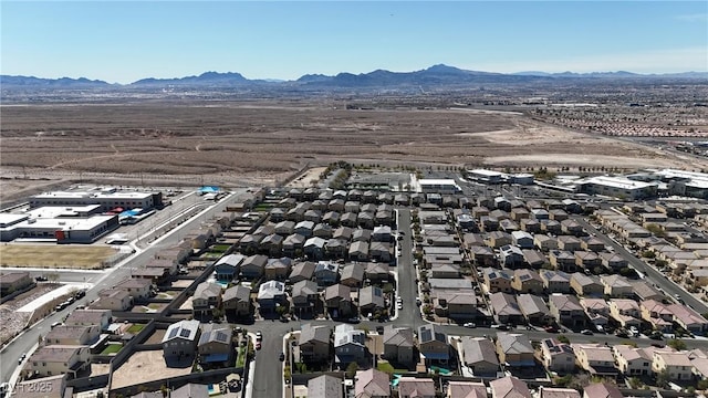 drone / aerial view featuring a mountain view and a residential view