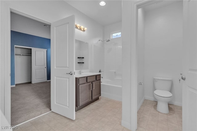 full bathroom featuring bathing tub / shower combination, baseboards, toilet, and vanity