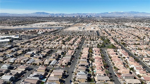 aerial view with a mountain view and a residential view