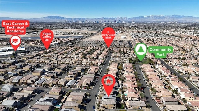 bird's eye view featuring a mountain view and a residential view