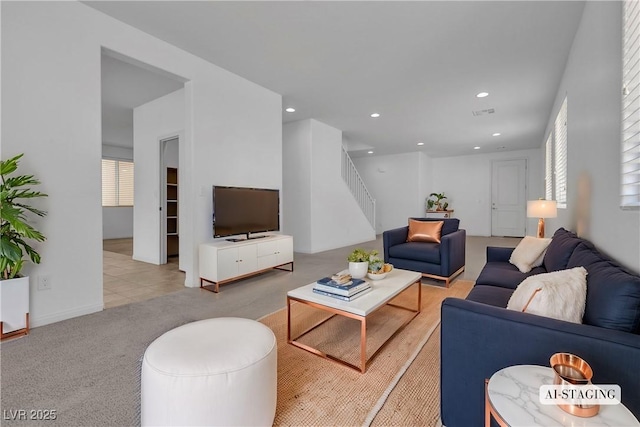 living room with stairway, carpet flooring, and recessed lighting