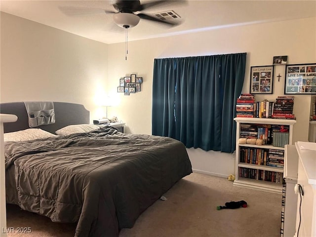 bedroom with a ceiling fan, carpet, and visible vents