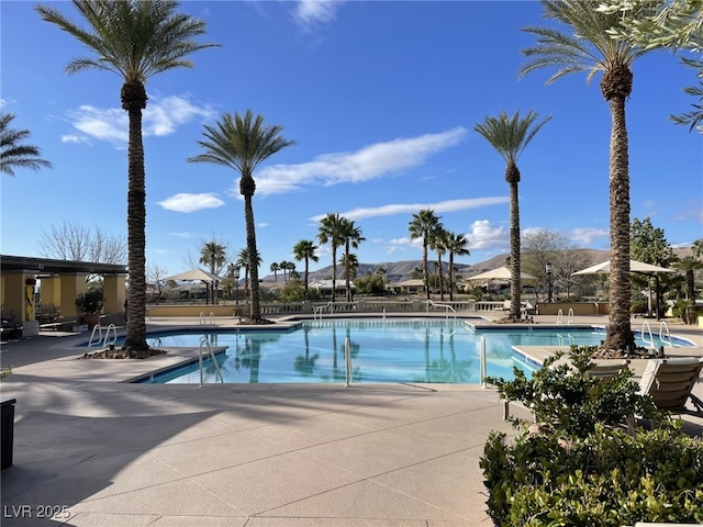 pool with a patio