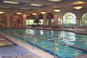 community pool featuring a patio area