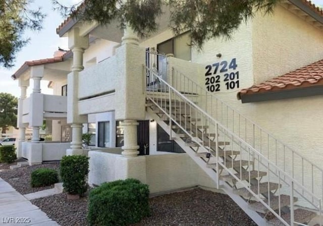 view of property with stairway