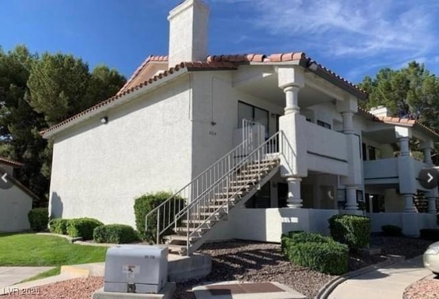 view of building exterior featuring stairs